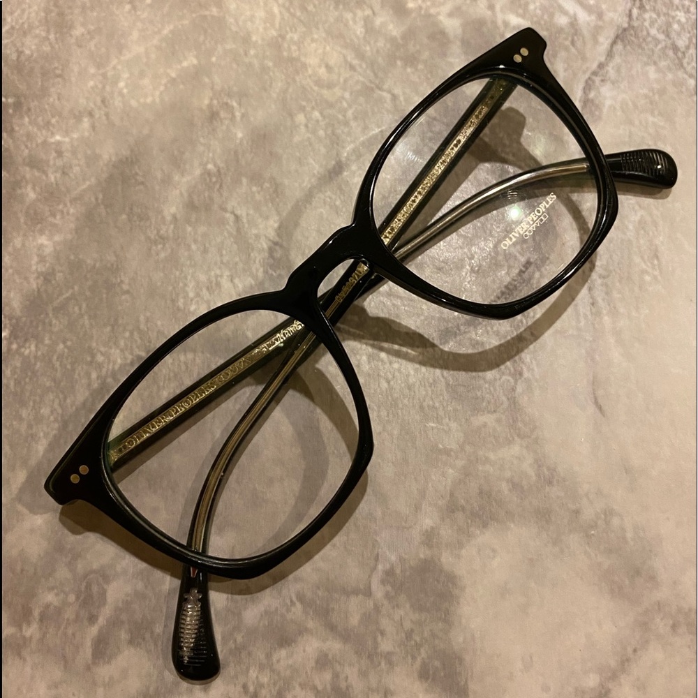 Oliver Peoples “L.A. Coen” eyeglasses.